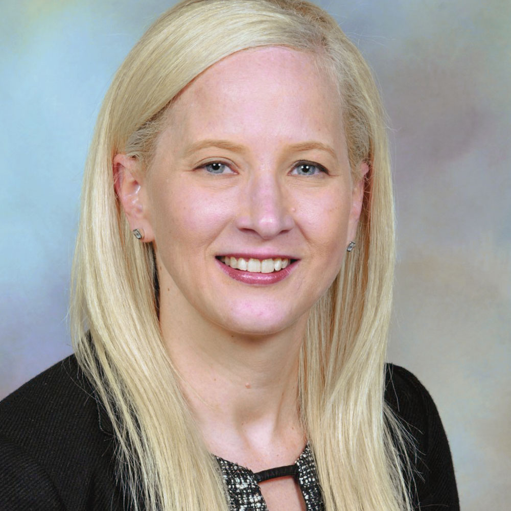 Dr. Carrie Kovarik